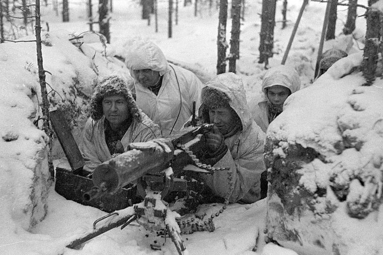 Finnish troops deploy a machine gun during the Winter War of 1939-1940