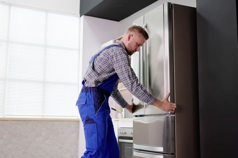 a man installing the refrigerator