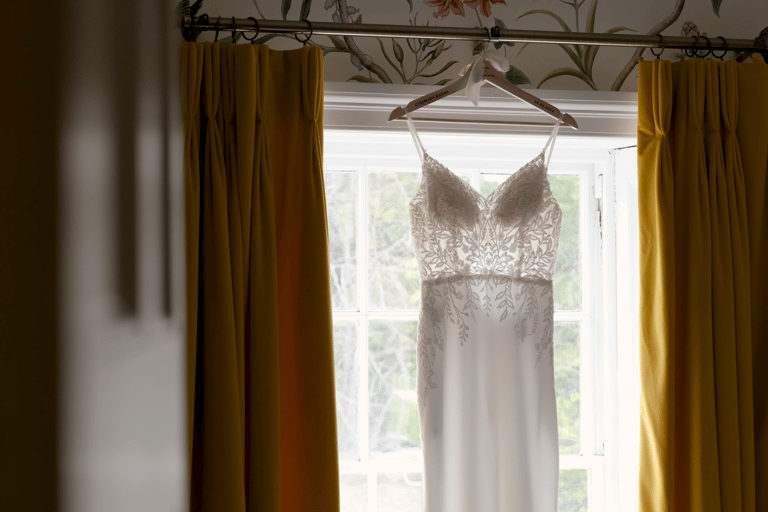 A wedding dress hanging up