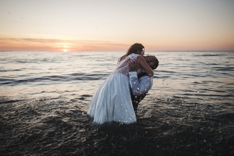 bride and groom kissing in Arcachon Bay wedding dress