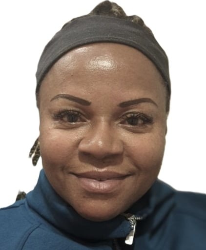 Shaded eyebrow tattoo giving gentle structure on rich brown skin tone”