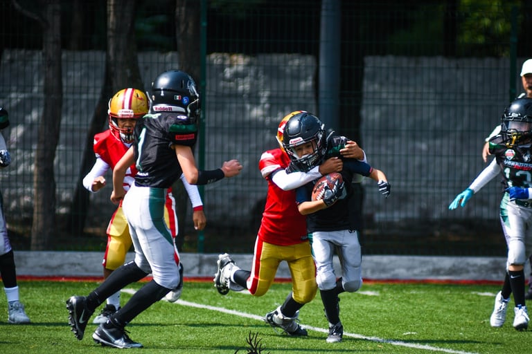 Jugadores de Football Americano en plena jugada