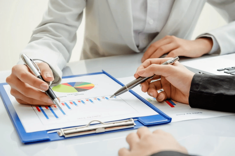 a doctor showing a chart to a patient