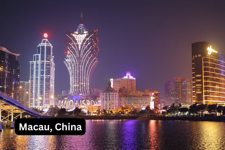 A dazzling night view of the Macau skyline, China, with the city's iconic casinos and hotels illumin