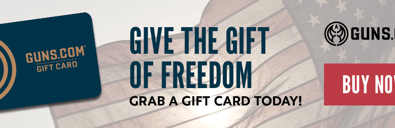 Guns.com gift card banner with American flag background and text that says Give the Gift of Freedom. Grab a gift card today a