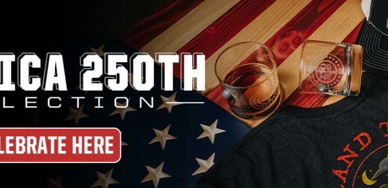 Nine Line Apparel America 250th Collection banner featuring whiskey glass, American flag, and patriotic clothing. Shop the co