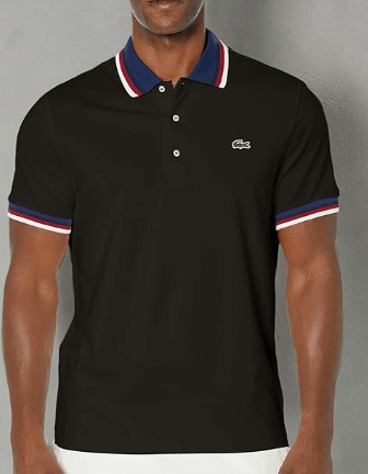 a man in a black shirt and white pants