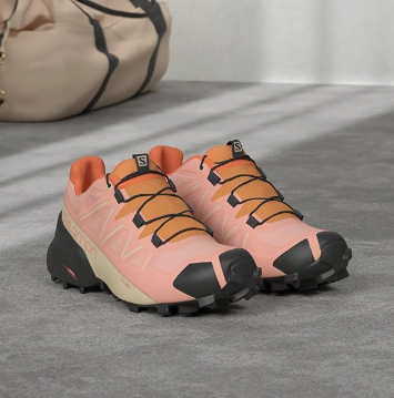 a pair of womens salomon speedcross 5 trail running shoes