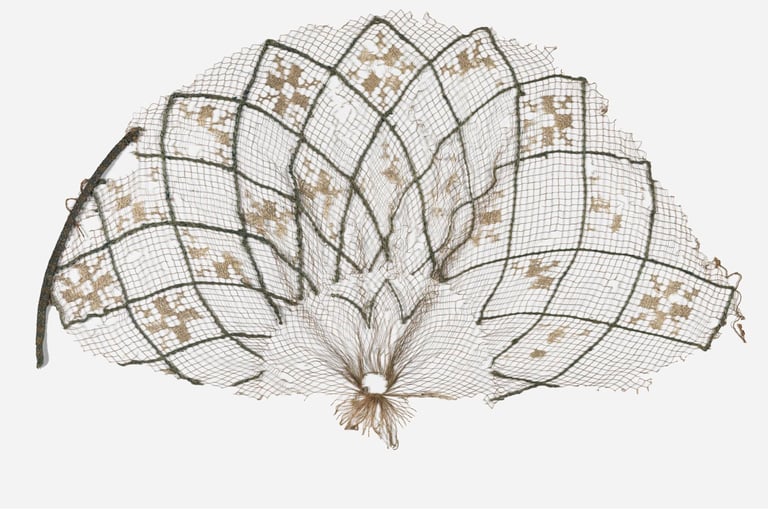 a cutting of a vintage filet crochet hairnet