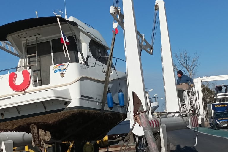 Henri lifts our boat from the dock>.