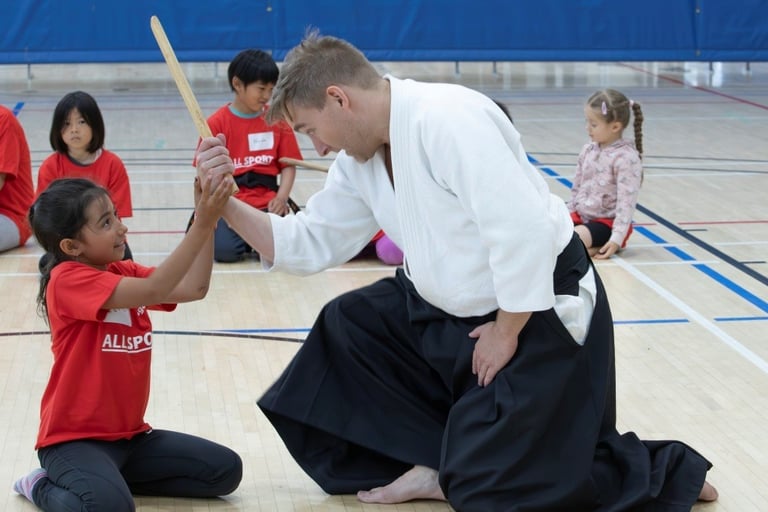 practicing martial arts with weapons in Calgary aikido class