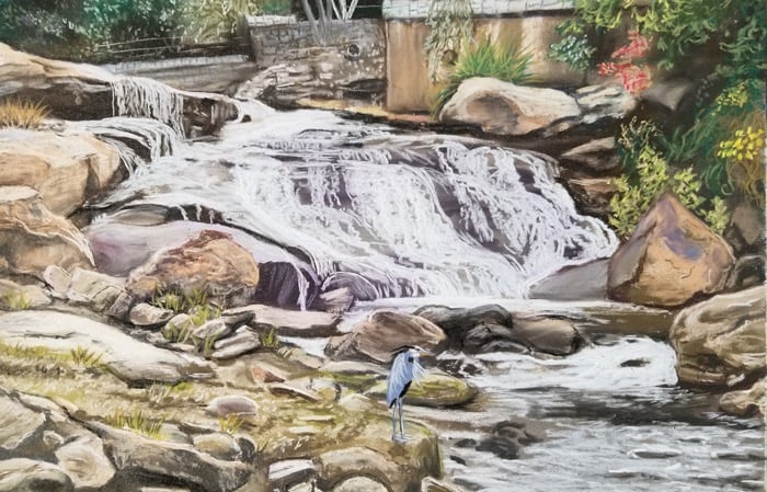 A pastel painting of Falls Park in Greenville, South Carolina with a great blue heron.