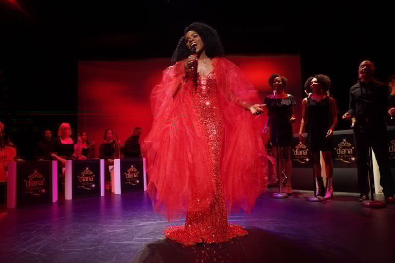 a woman in a red dress and a microphone in front of a microphone
