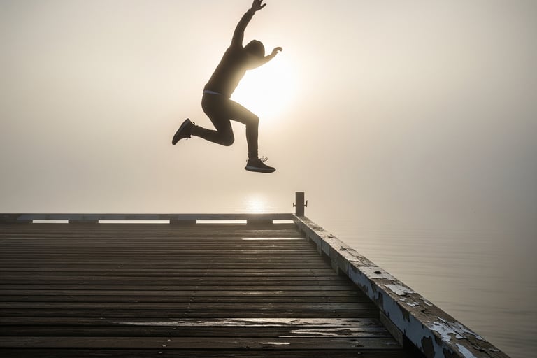Person leaping with confidence.