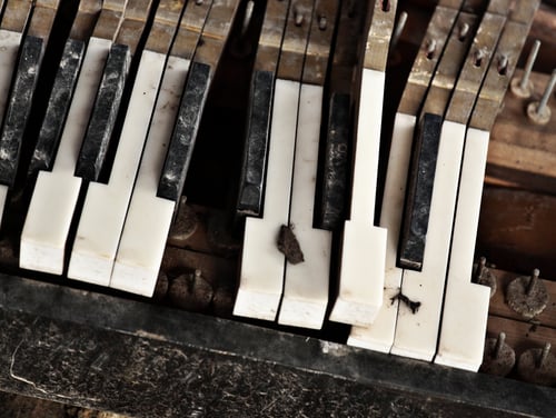 Smashed up broken piano