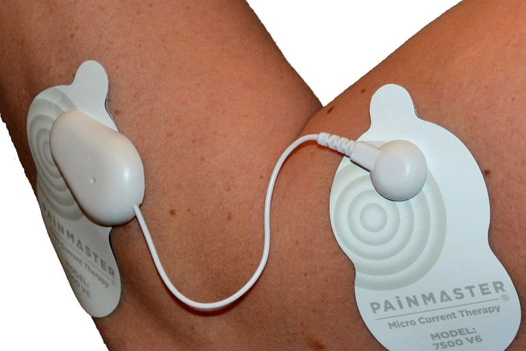 Painmaster patches attached to an elbow.
