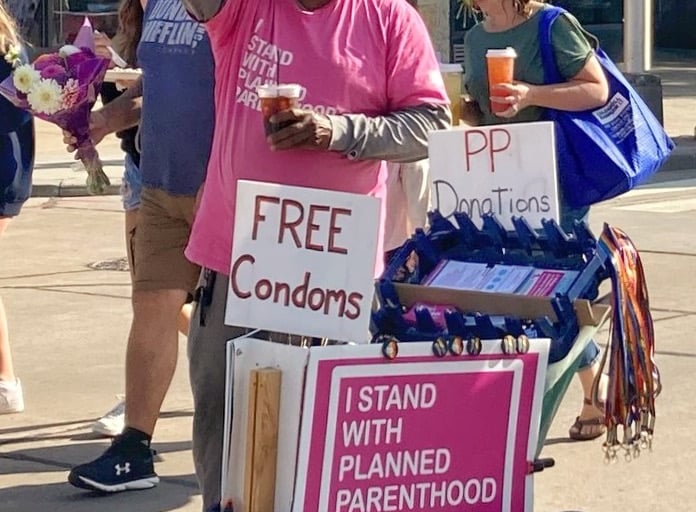 Man on the street promoting condom use in Appleton, Wisconsin. 