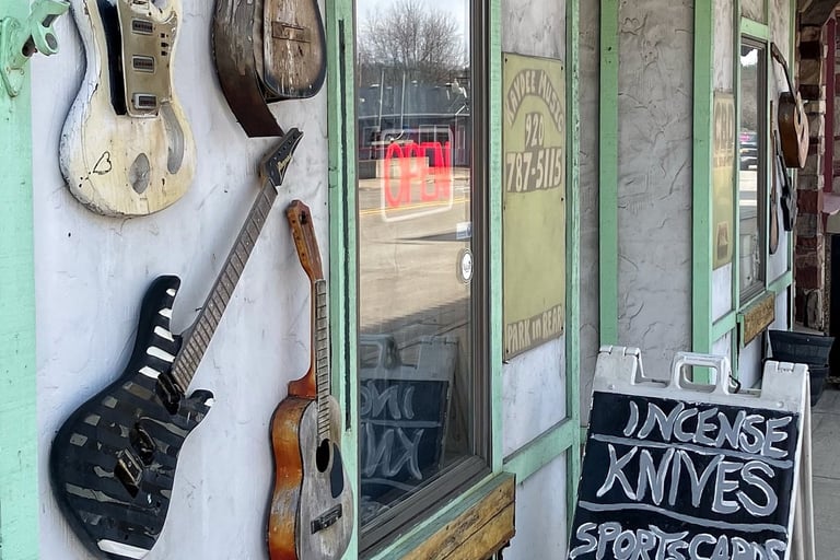 Guitars outside the door of a Main Street business in Wautoma, Wisconsin