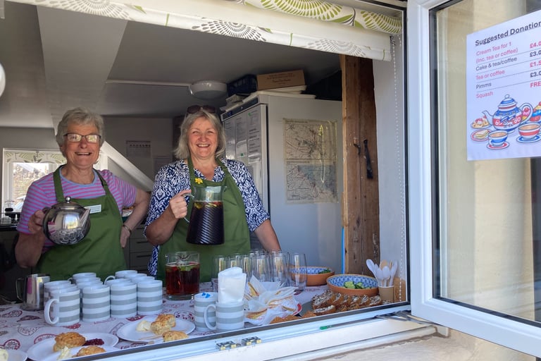 Westbury-sub-Mendip Community Shop Volunteers serving breakfast at an event