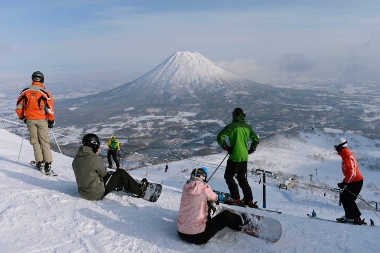 a group of people on a mountain top