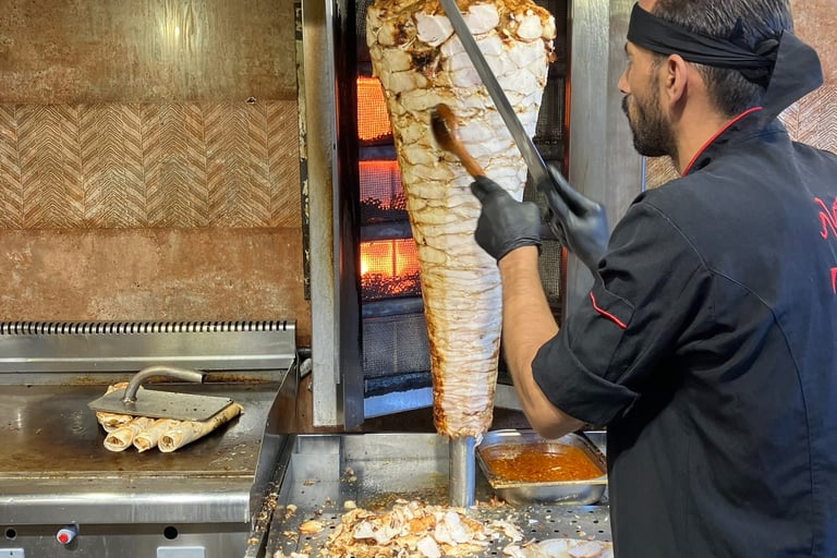 man making shawarma