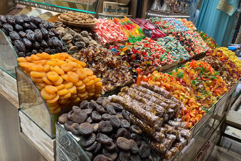 Stand of various fruits and sweets 