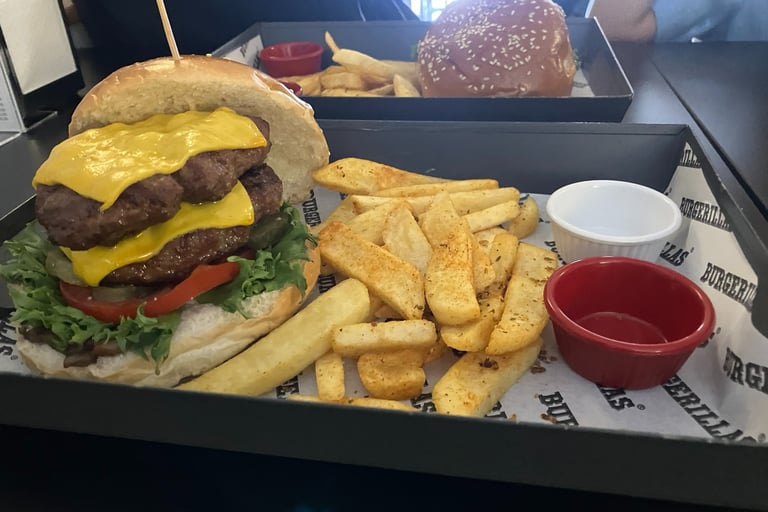 Double Cheeseburger and fries with sauces