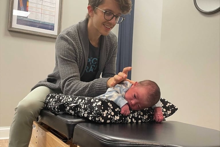 Gentle pediatric chiropractic adjustment in Franklin, TN for child with digestive issues