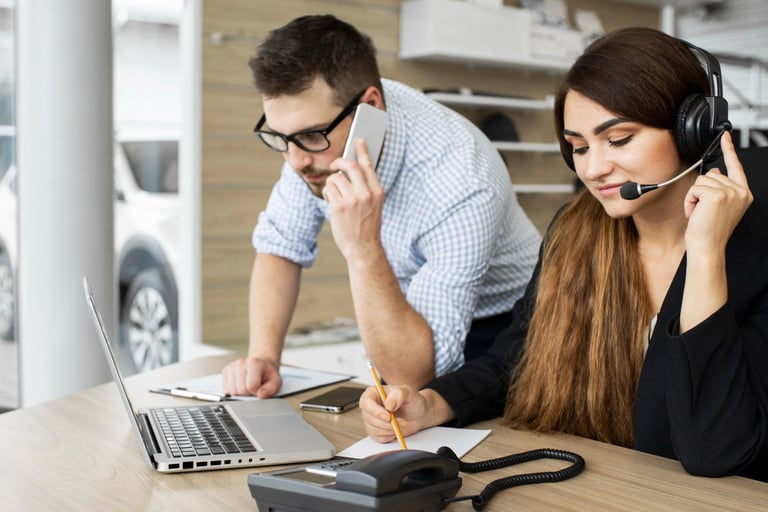 a man and woman in a call center