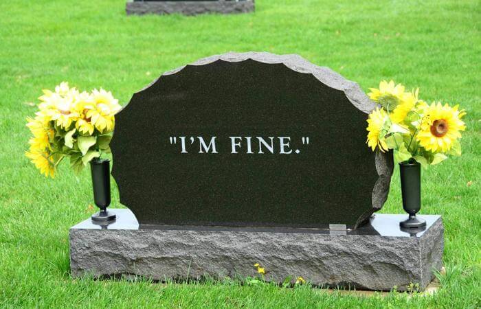 a stone memorial marked 'I'm fine'