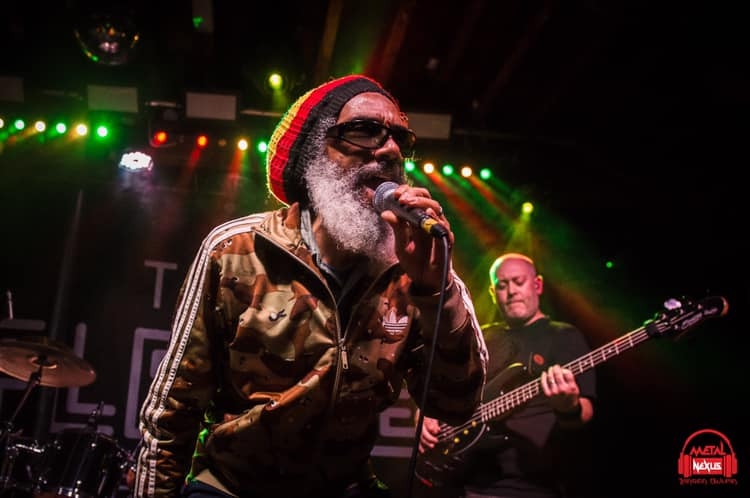 HR of Bad Brains performing live music entertainment on stage at concert with J Phoenix Booking Agen