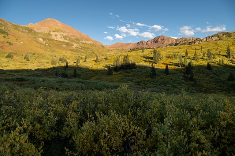 Bellview Peak and West Maroon Pass in luminous September evening sunlight