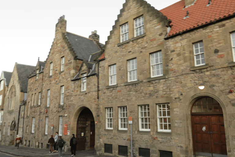 The entrance to the Pleasance Courtyard, through an archway in an old stone building.