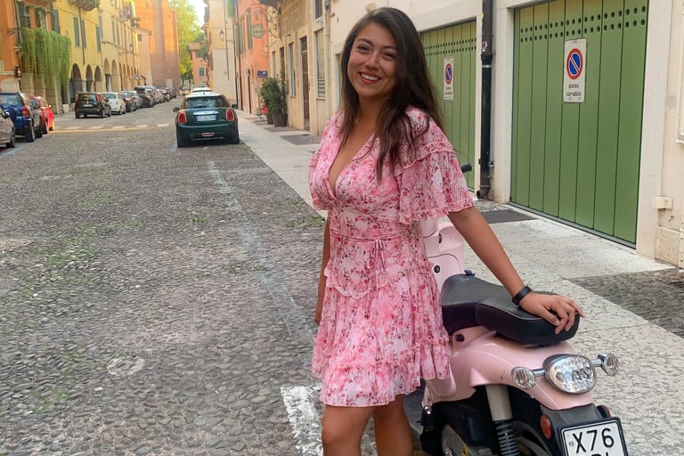 Diana next to a pink Vespa - Italy streets 