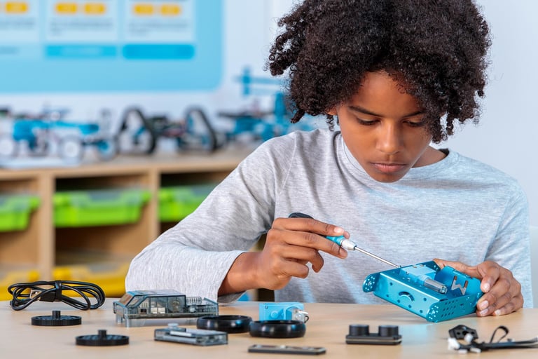 The blue Makeblock mBot2 coding robot with its metal chassis and CyberPI controller on top.