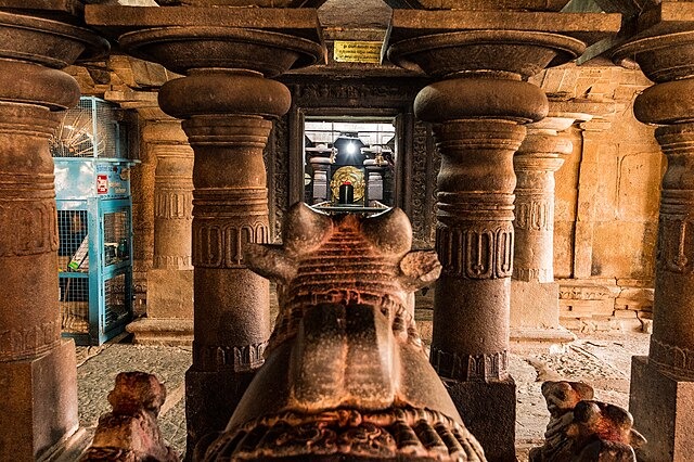 Interior of Bhoga Nandeeshwara Temple showing the sacred Nandi statue facing the Shivalinga, located near Nandi Hills
