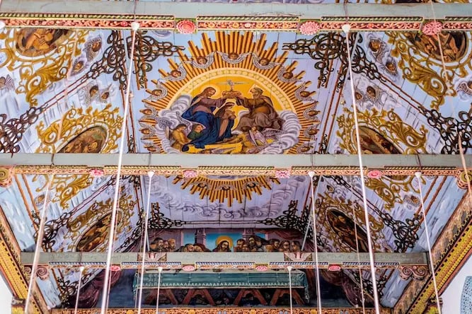 Intricate paintings on the wooden ceiling of Champakulam St. Mary’s Basilica in Kerala.