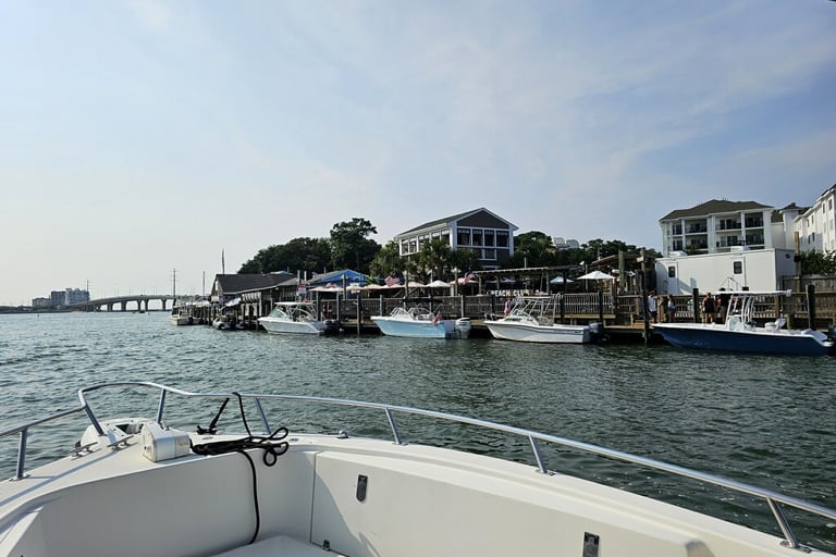 Boat view of Chicks Oyster Bar and boats in the Lynnhaven Inlet, Virginia Beach