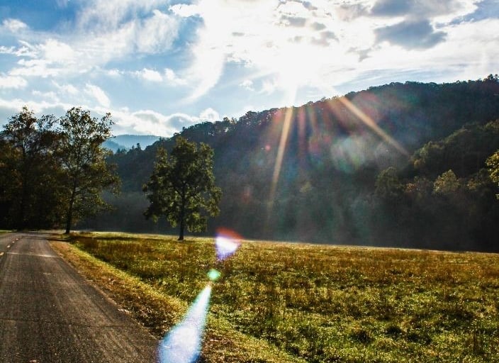 a road with a view of the Great Smoky Mountains