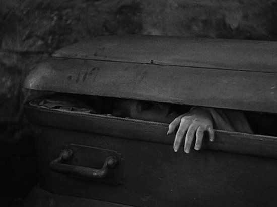 Blask and white opening coffin