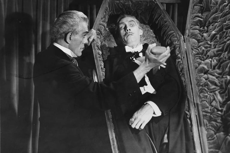 Boris Karloff with John Carradine as Dracula