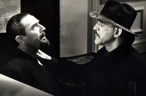 Bela Lugosi menaced by Boris Karloff