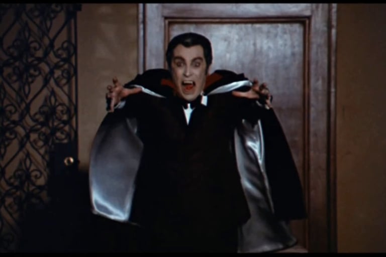 Robert Quarry as Count Yorga surprises another victim.