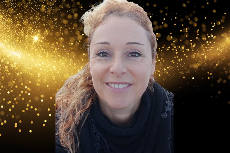 a woman with blonde hair and a black scarf