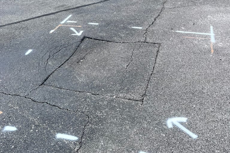 Localized asphalt pavement failure