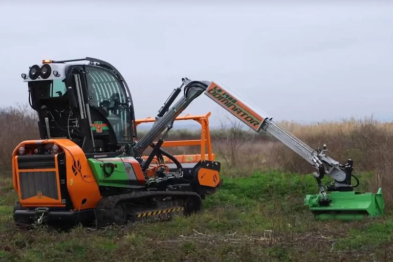 Green Climber LV 1400 Dominator Model with side are attachment clearing some dense vegetation