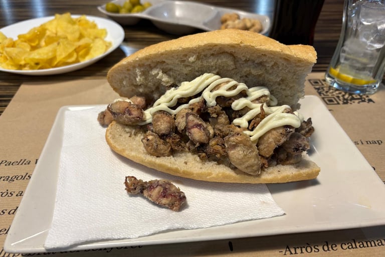 Traditional Spanish bocadillo sandwich with crispy fried baby squid and aioli mayonnaise.