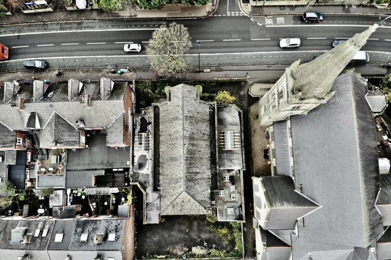 Aerial image of buildings showing roof and envelope condition