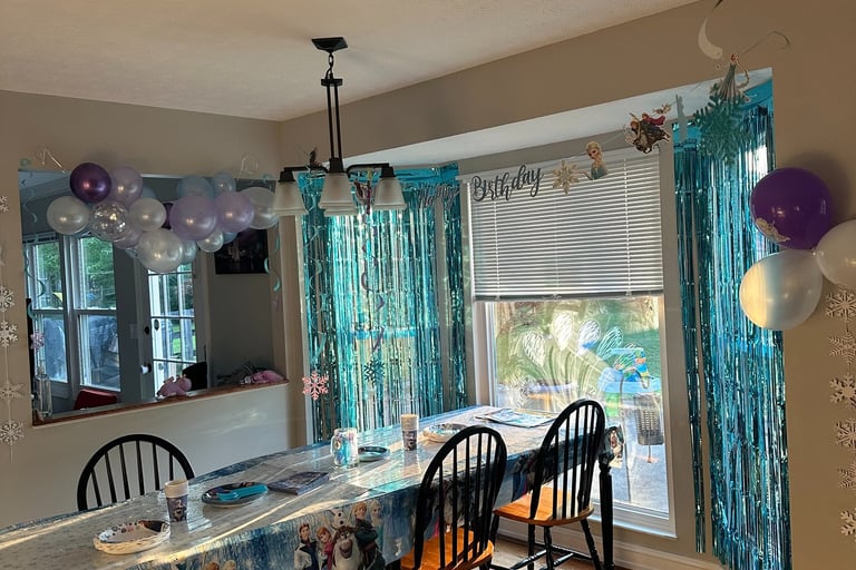budget birthday party decorations balloons and happy birthday banner