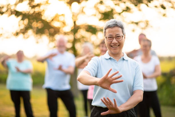 Group tai chi practice outdoors